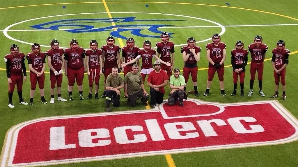 football-team-on-indoor-synthetic-field