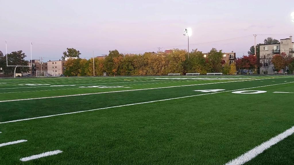 synthetic-football-field-evening-stadium-lights